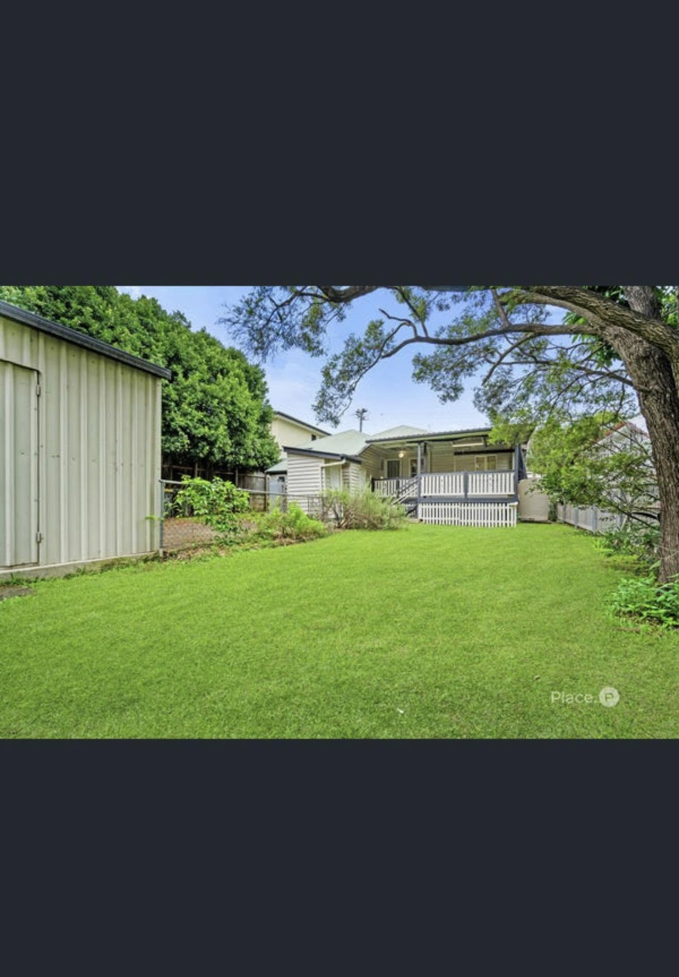 Before — backyard photo without pool
