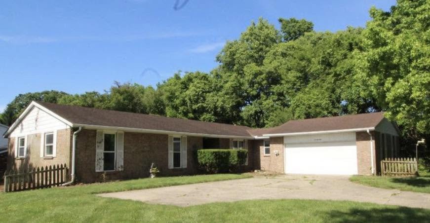 Before — suburban ranch house yard without pool